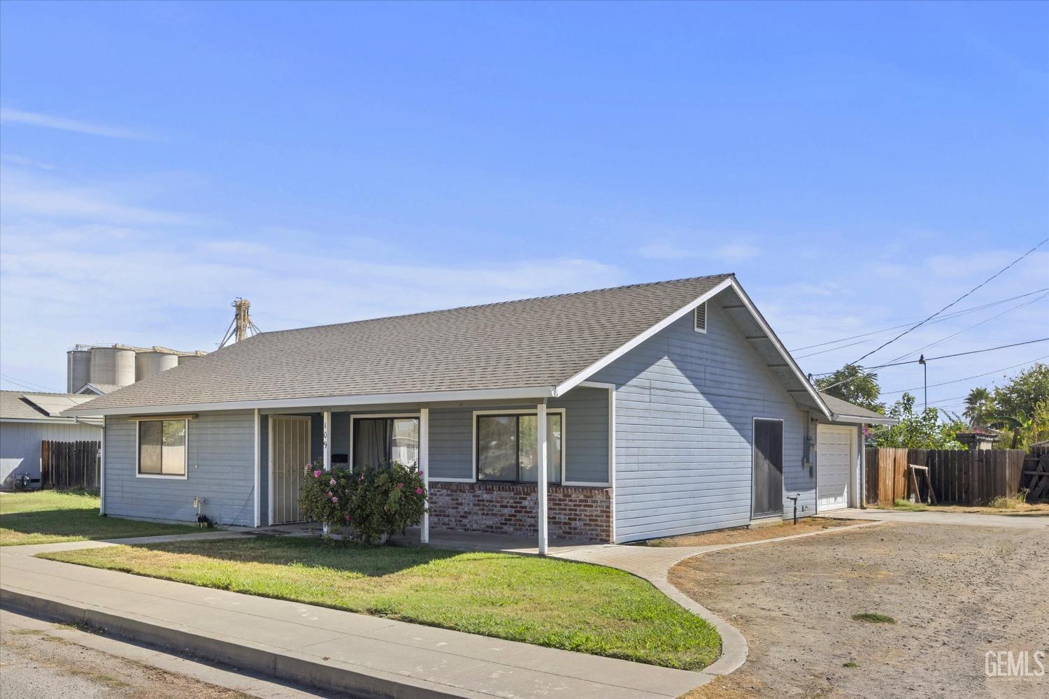 Undisclosed Address Chowchilla, CA 93610 - Photo 3 of 29 a view of a house with a yard