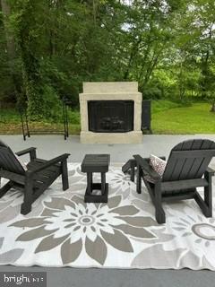 321 Tomlin Station Road Mullica Hill, NJ 08062 - Photo 7 of 21 Cozy patio with fireplace