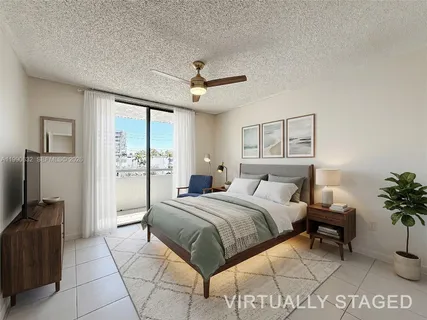 a open kitchen with stainless steel appliances granite countertop a refrigerator and a stove