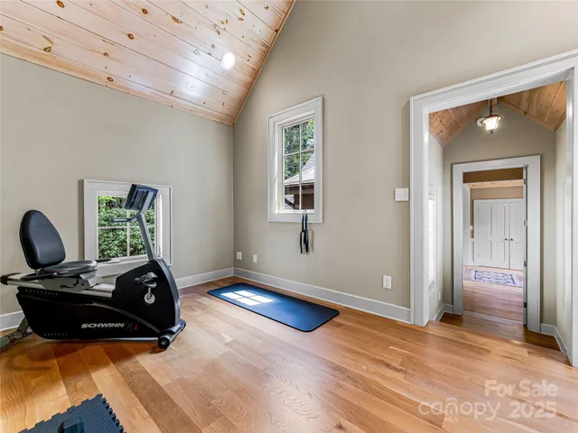 a room with a bed and a window