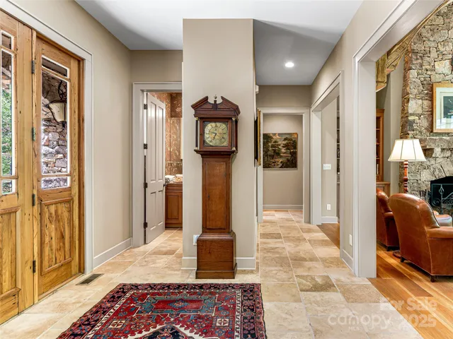 a view of a hallway with a living room