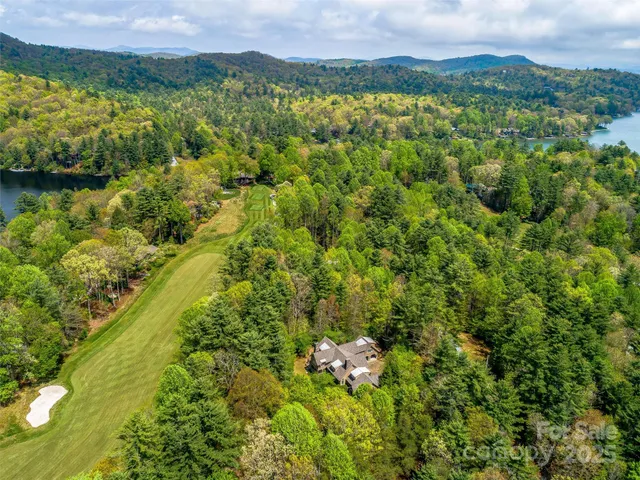 a view of a house with a swimming pool