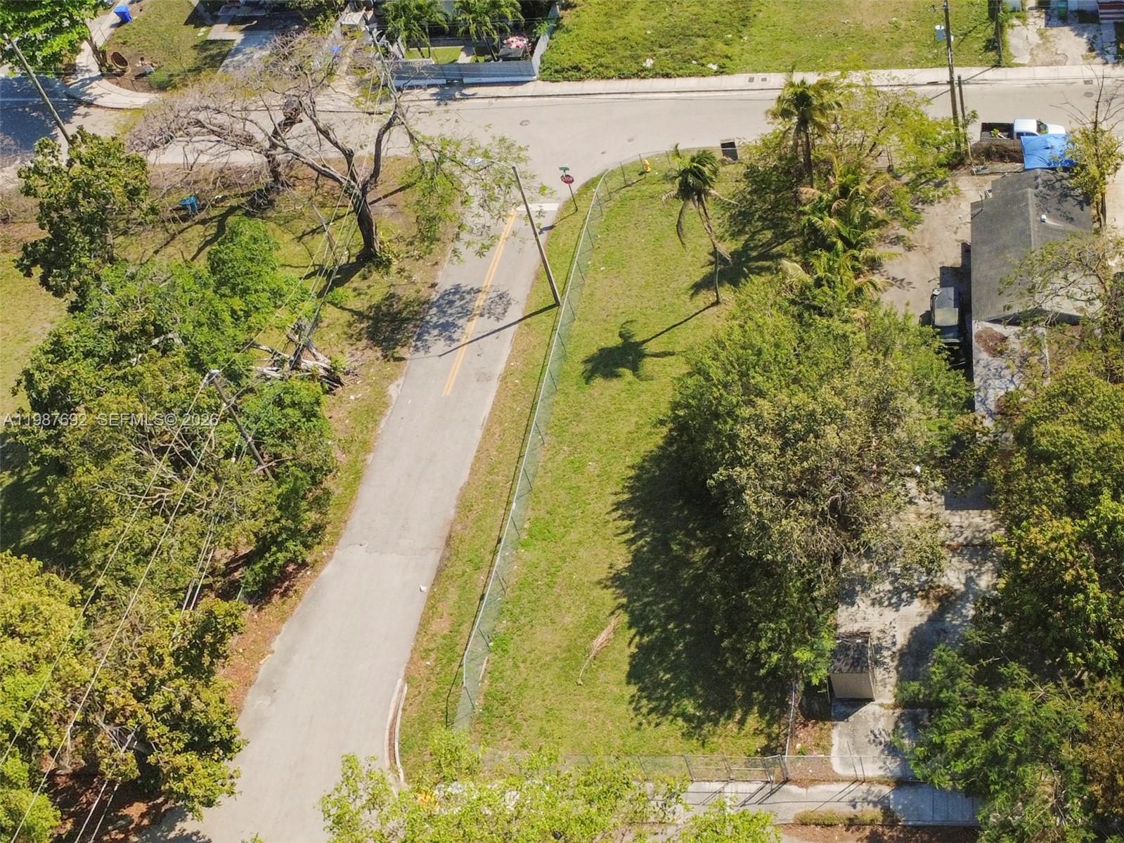 800 Northwest 30th Street Miami, FL 33127 - Photo 2 of 3 a aerial view of a yard with swimming pool