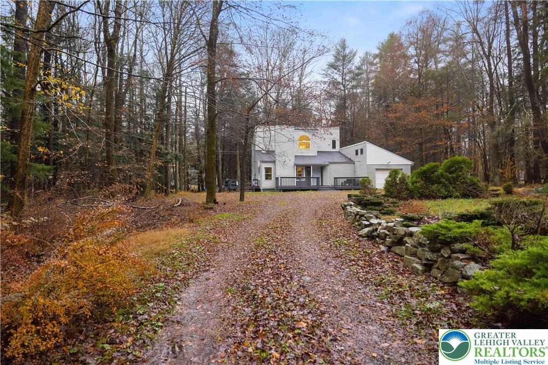 421 King Arthur Road Pocono Lake, PA 18347 - Photo 24 of 29 a view of a town with trees and houses