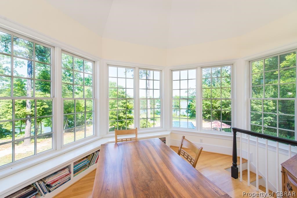 1193 West Point Road Lancaster, VA 22503 - Photo 45 of 50 a view of a room with wooden floor and balcony