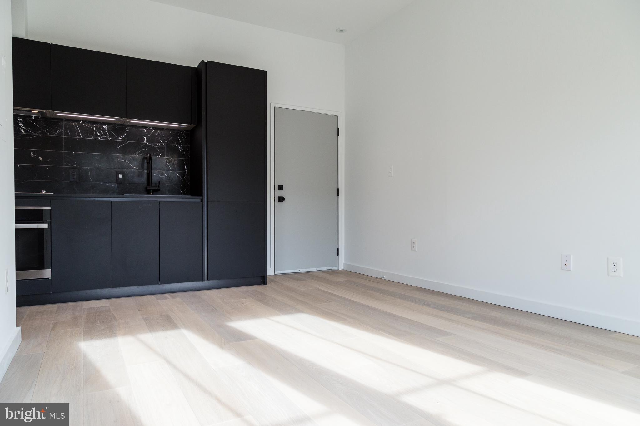 1443 Euclid Street Northwest, Unit 5 Washington, DC 20009 - Photo 2 of 13 a view of wooden door