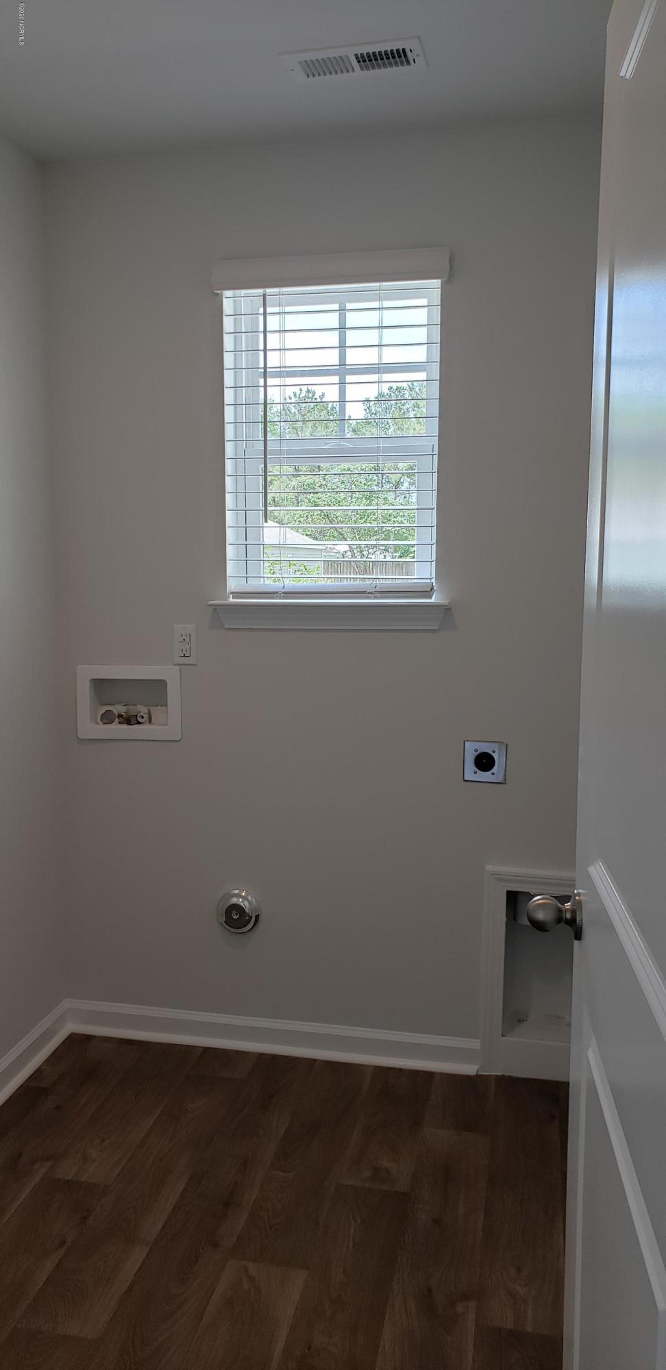 402 Ellis Road Southeast, Unit LOT #49 Bolivia, NC 28422 - Photo 16 of 21 ACTUAL HOME PHOTO Laundry Room