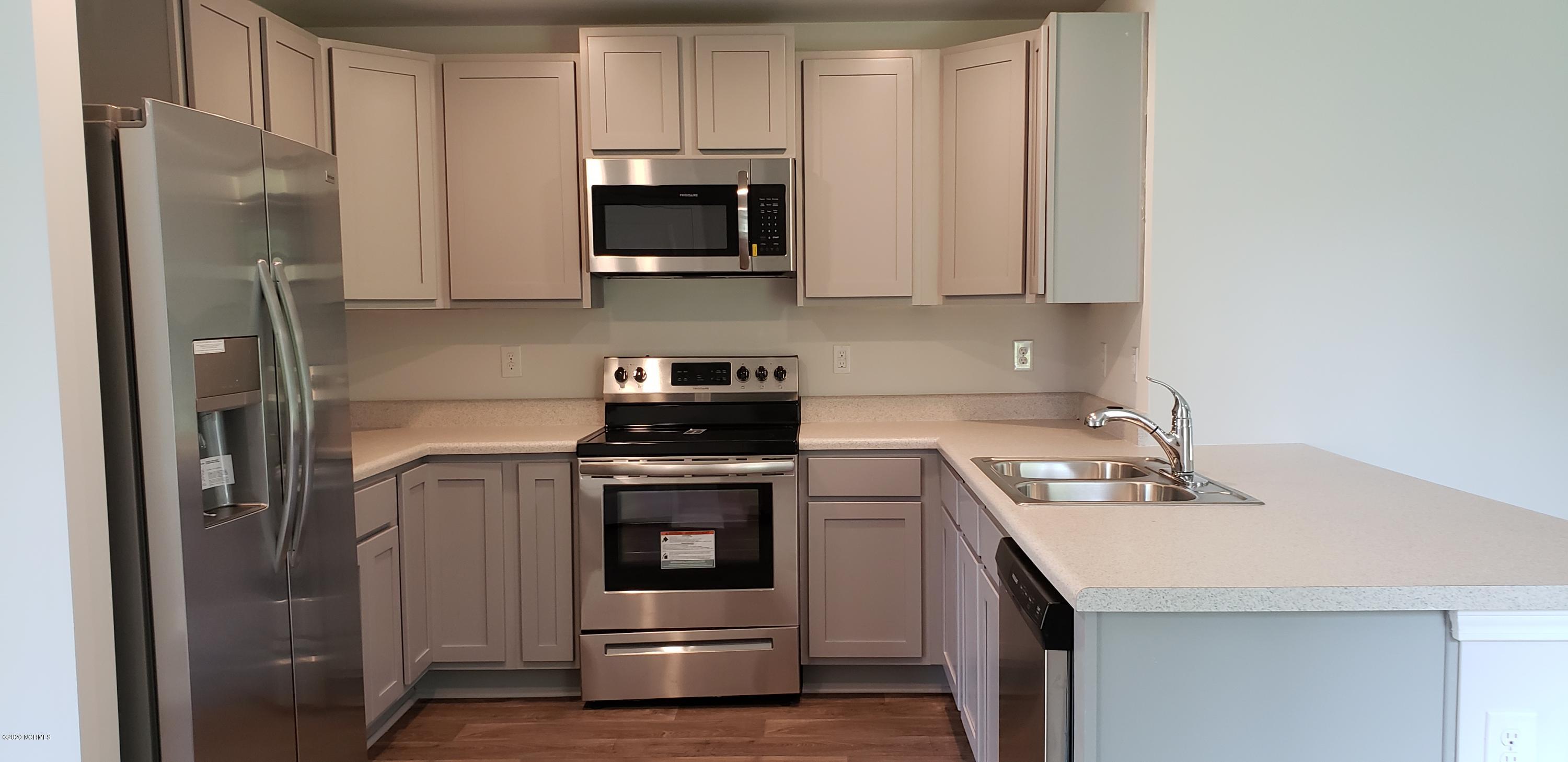 402 Ellis Road Southeast, Unit LOT #49 Bolivia, NC 28422 - Photo 2 of 21 ACTUAL HOME PHOTO. Refrigerator included!