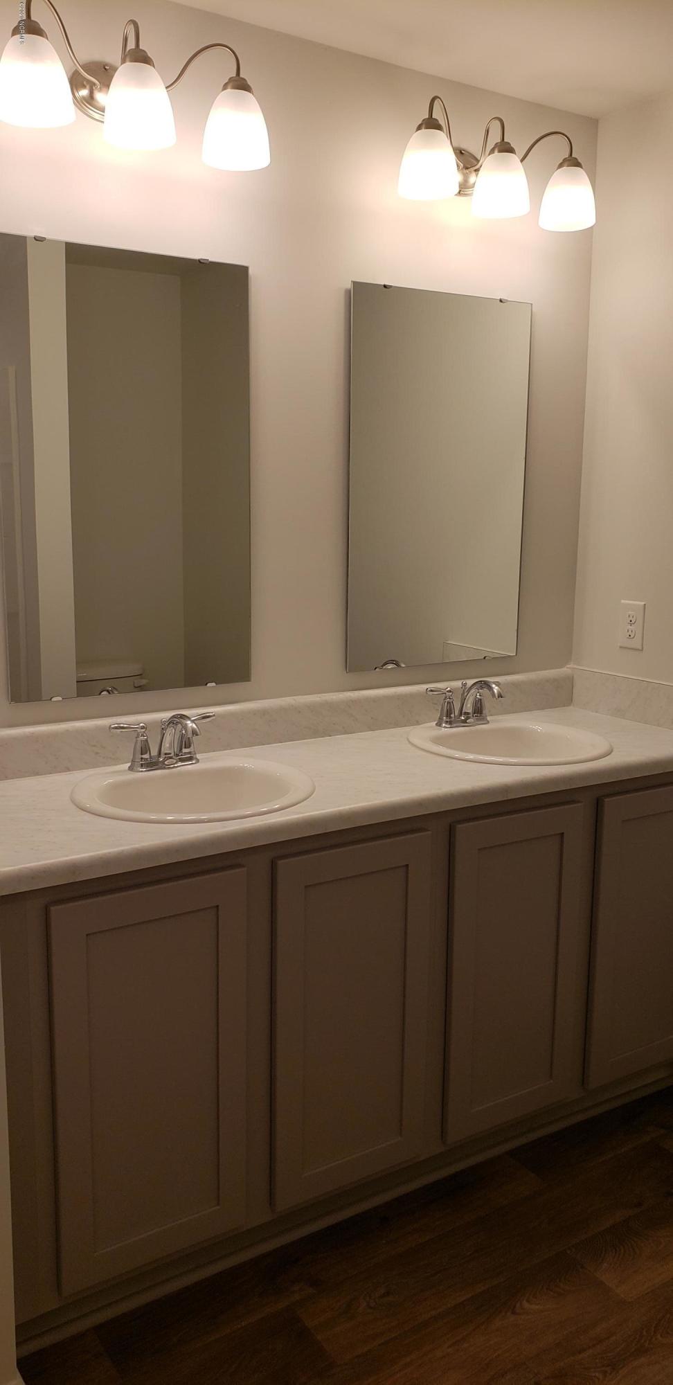 402 Ellis Road Southeast, Unit LOT #49 Bolivia, NC 28422 - Photo 3 of 21 ACTUAL HOME PHOTO. Master Bath double