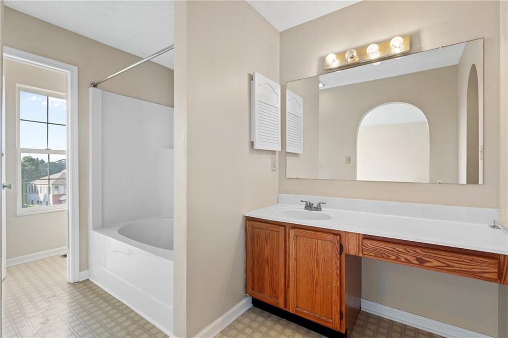 6 Wellington Court McKees Rocks, PA 15136 - Photo 13 of 24 a bathroom with a sink and a mirror