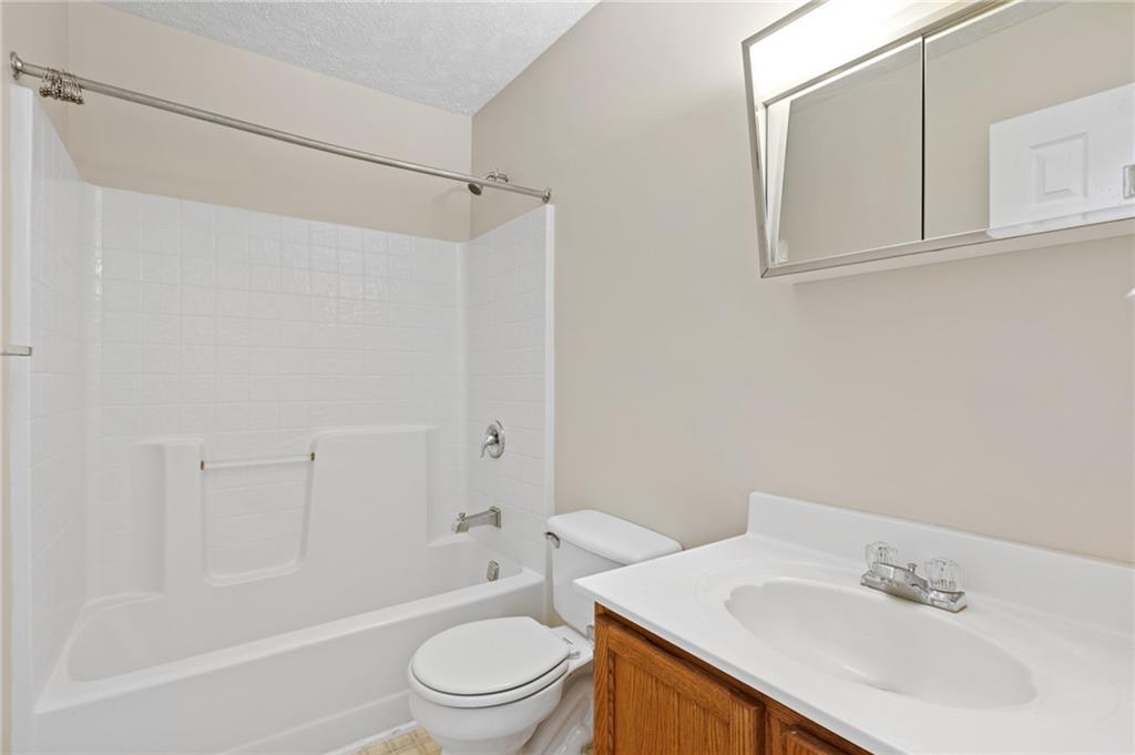 6 Wellington Court McKees Rocks, PA 15136 - Photo 19 of 24 a bathroom with a sink toilet and shower