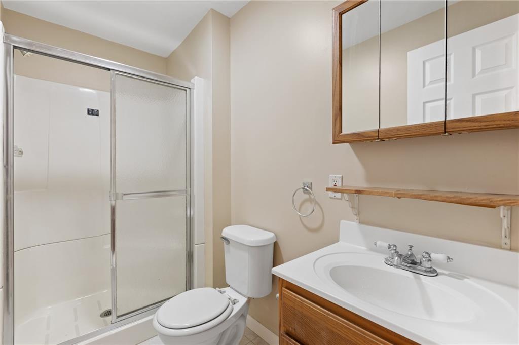 6 Wellington Court McKees Rocks, PA 15136 - Photo 22 of 24 a bathroom with a sink toilet and shower