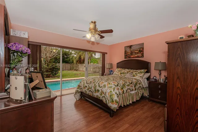 a bed room with a bed and a television