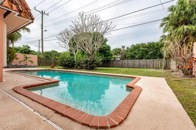 a view of outdoor space yard and swimming pool