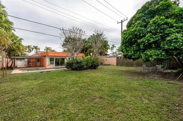 a garden view with a sitting space