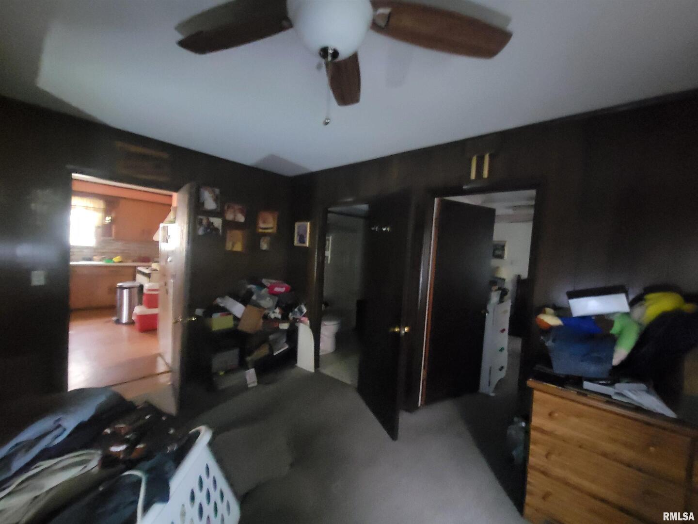 905 West Monroe Street Herrin, IL 62948 - Photo 14 of 14 a kitchen with a refrigerator and a stove