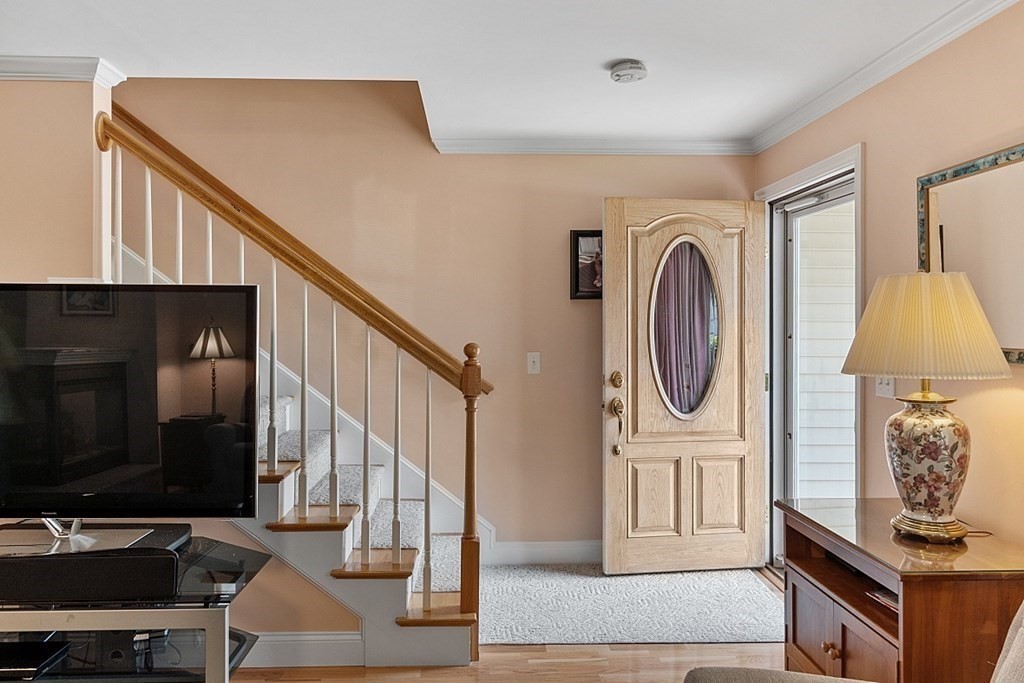 216 Rangeway Road, Unit 183 Billerica, MA 01862 - Photo 13 of 35 a view of a livingroom with furniture and staircase