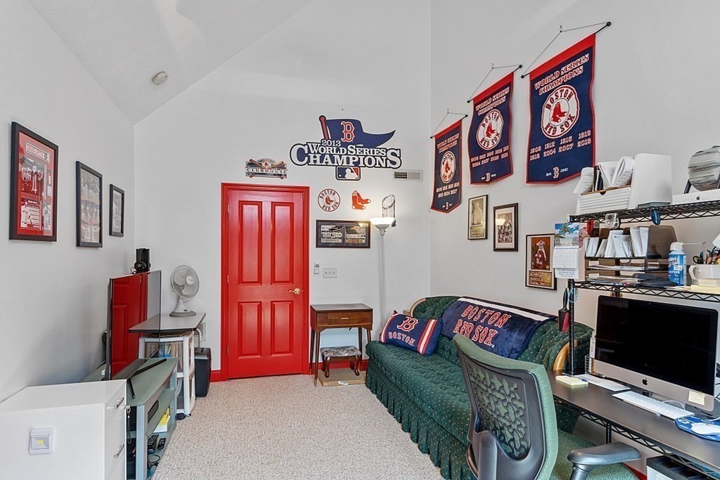 216 Rangeway Road, Unit 183 Billerica, MA 01862 - Photo 22 of 35 a living room with furniture and a flat screen tv