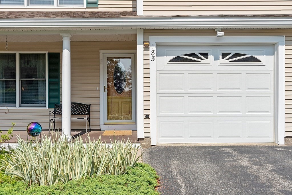 216 Rangeway Road, Unit 183 Billerica, MA 01862 - Photo 31 of 35 a view of front door of house with a yard