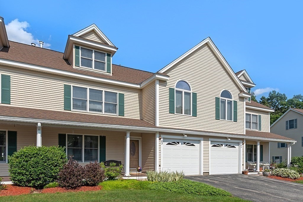 216 Rangeway Road, Unit 183 Billerica, MA 01862 - Photo 32 of 35 a front view of a house with garden