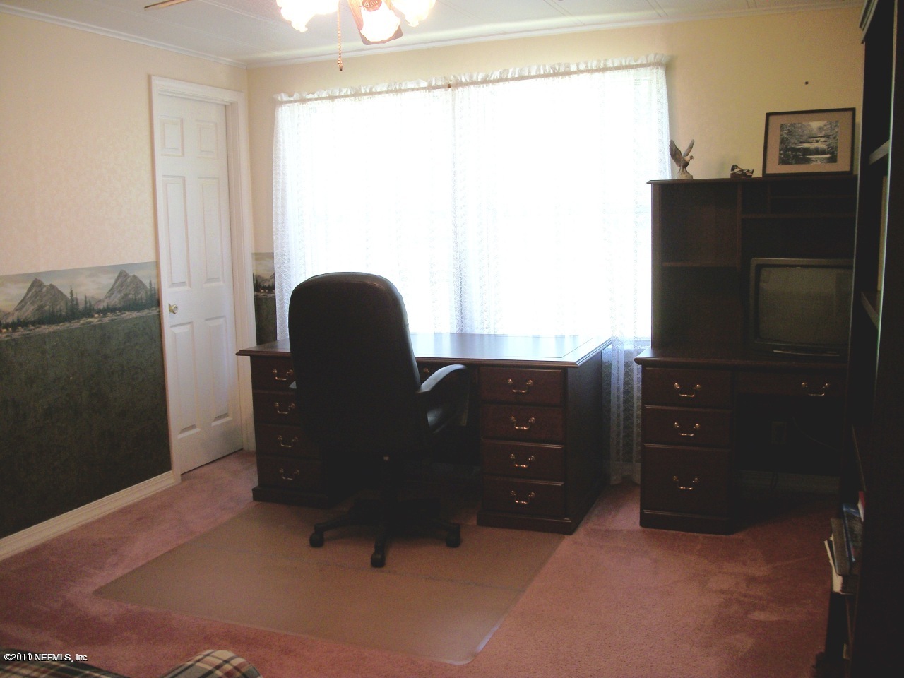 2855 Parrish Cemetery Road Jacksonville, FL 32221 - Photo 5 of 16 a living room with furniture and a air conditioner vent