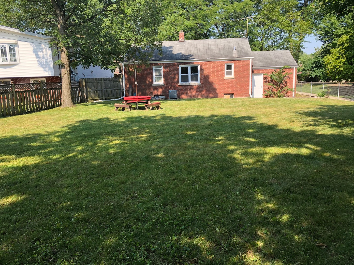 1347 Tyrell Avenue Park Ridge, IL 60068 - Photo 13 of 13 a view of a house with a yard porch and sitting area
