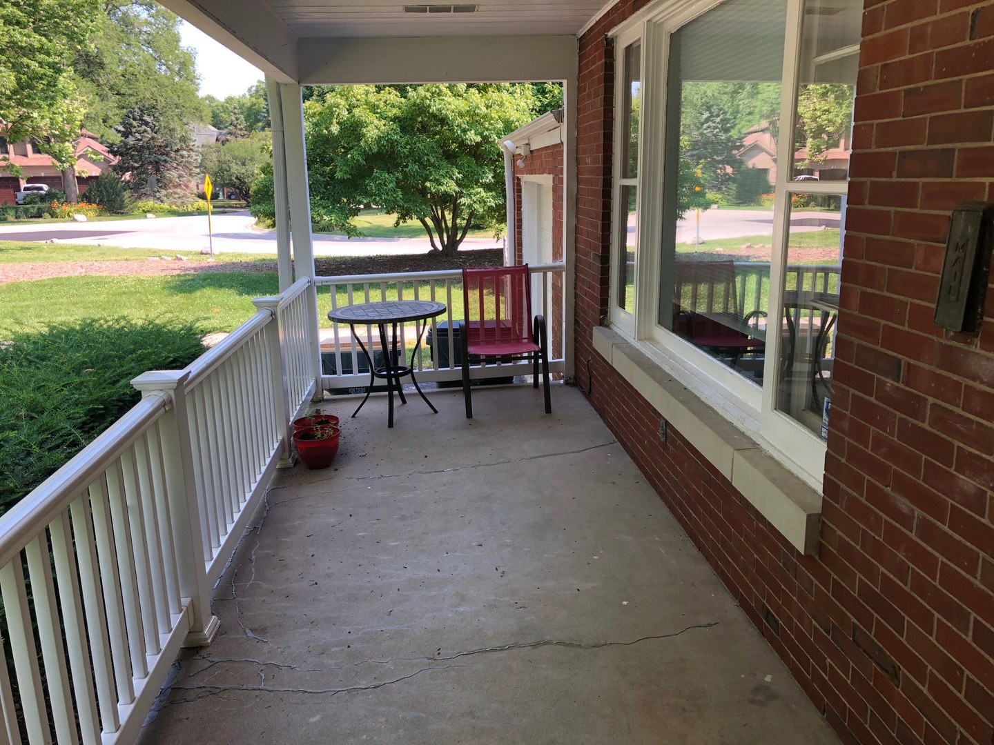 1347 Tyrell Avenue Park Ridge, IL 60068 - Photo 3 of 13 a balcony with chairs and a yard