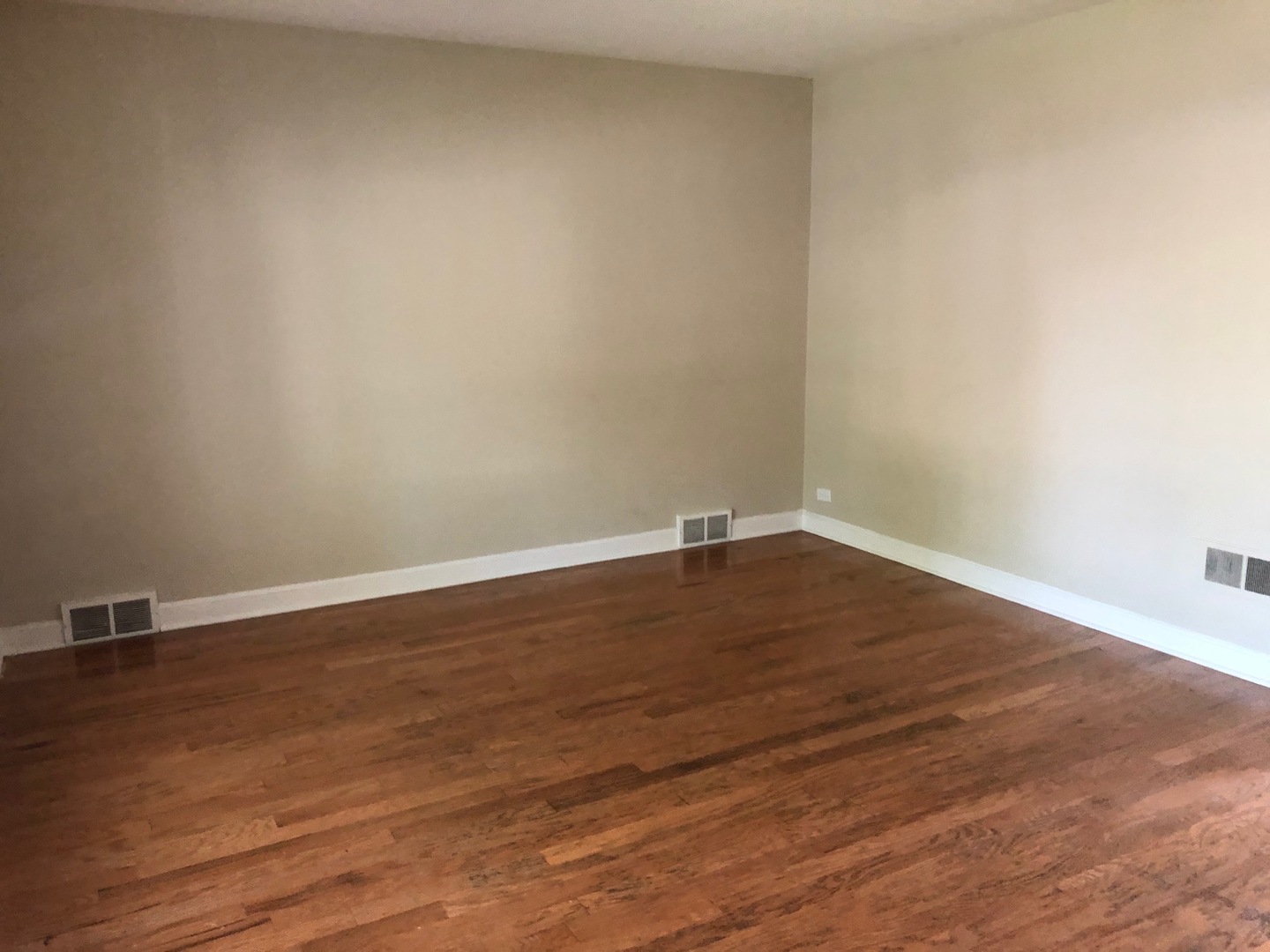 1347 Tyrell Avenue Park Ridge, IL 60068 - Photo 4 of 13 a view of empty room with wooden floor