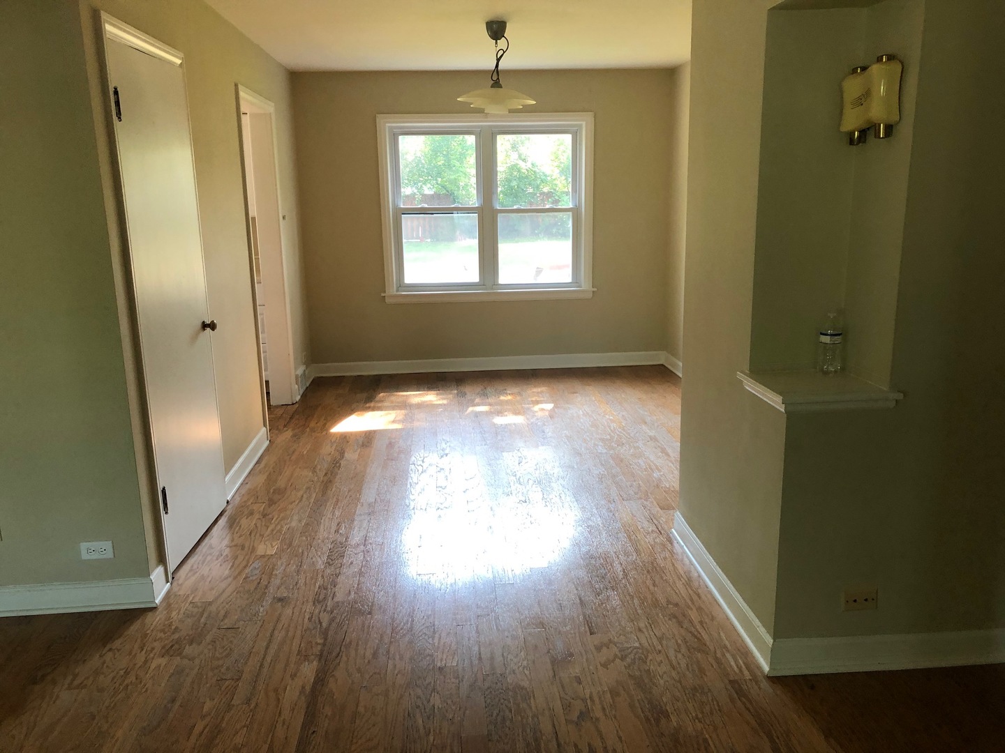 1347 Tyrell Avenue Park Ridge, IL 60068 - Photo 5 of 13 wooden floor in an empty room with a window