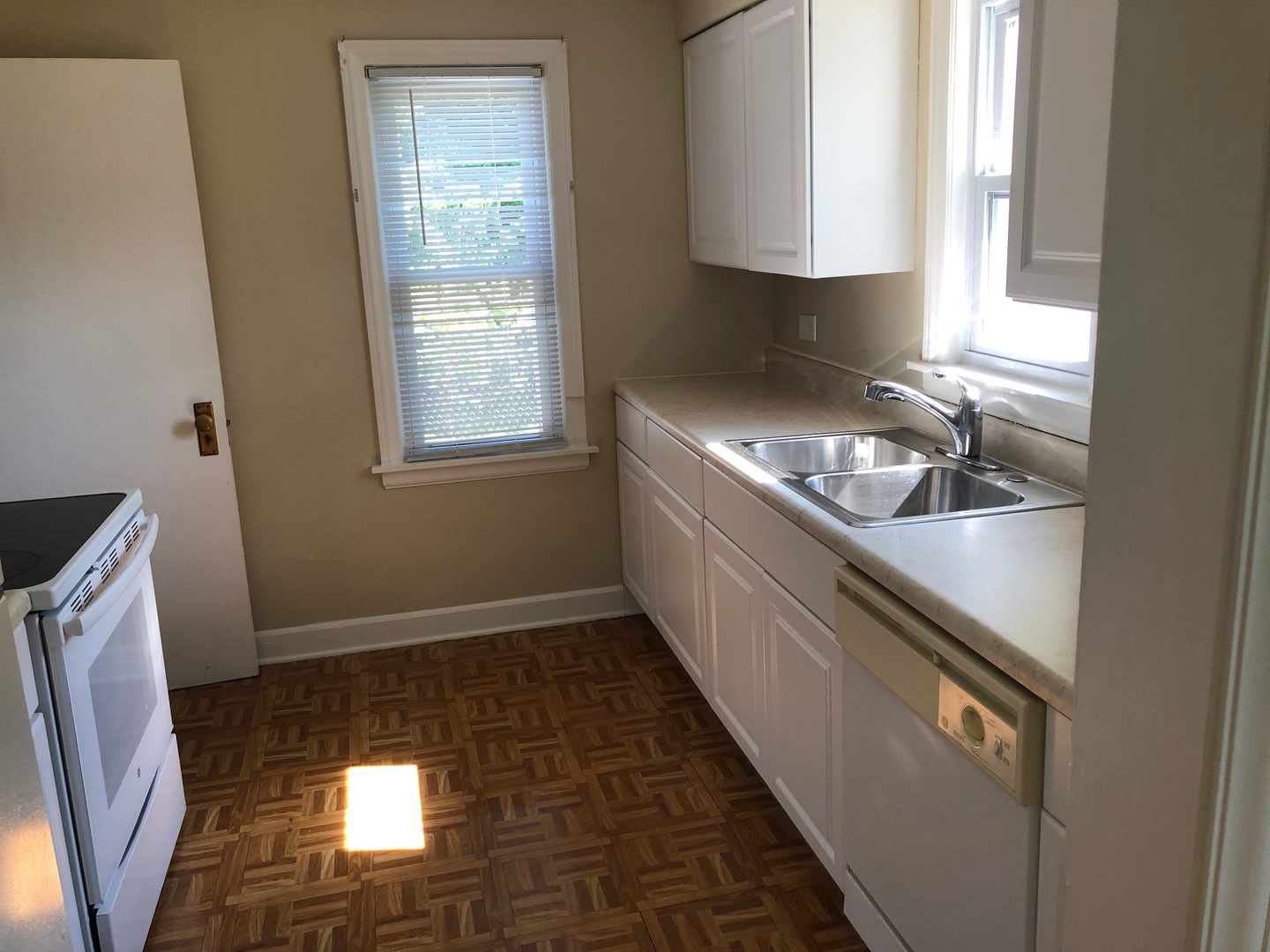 1347 Tyrell Avenue Park Ridge, IL 60068 - Photo 9 of 13 a kitchen with a sink a stove and a window