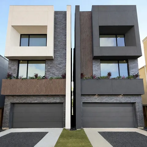 a front view of a house with a garage