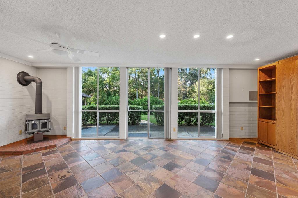 16522 Orchard Bend Road Poway, CA 92064 - Photo 14 of 26 a view of empty room with floor to ceiling windows and floor to ceiling window