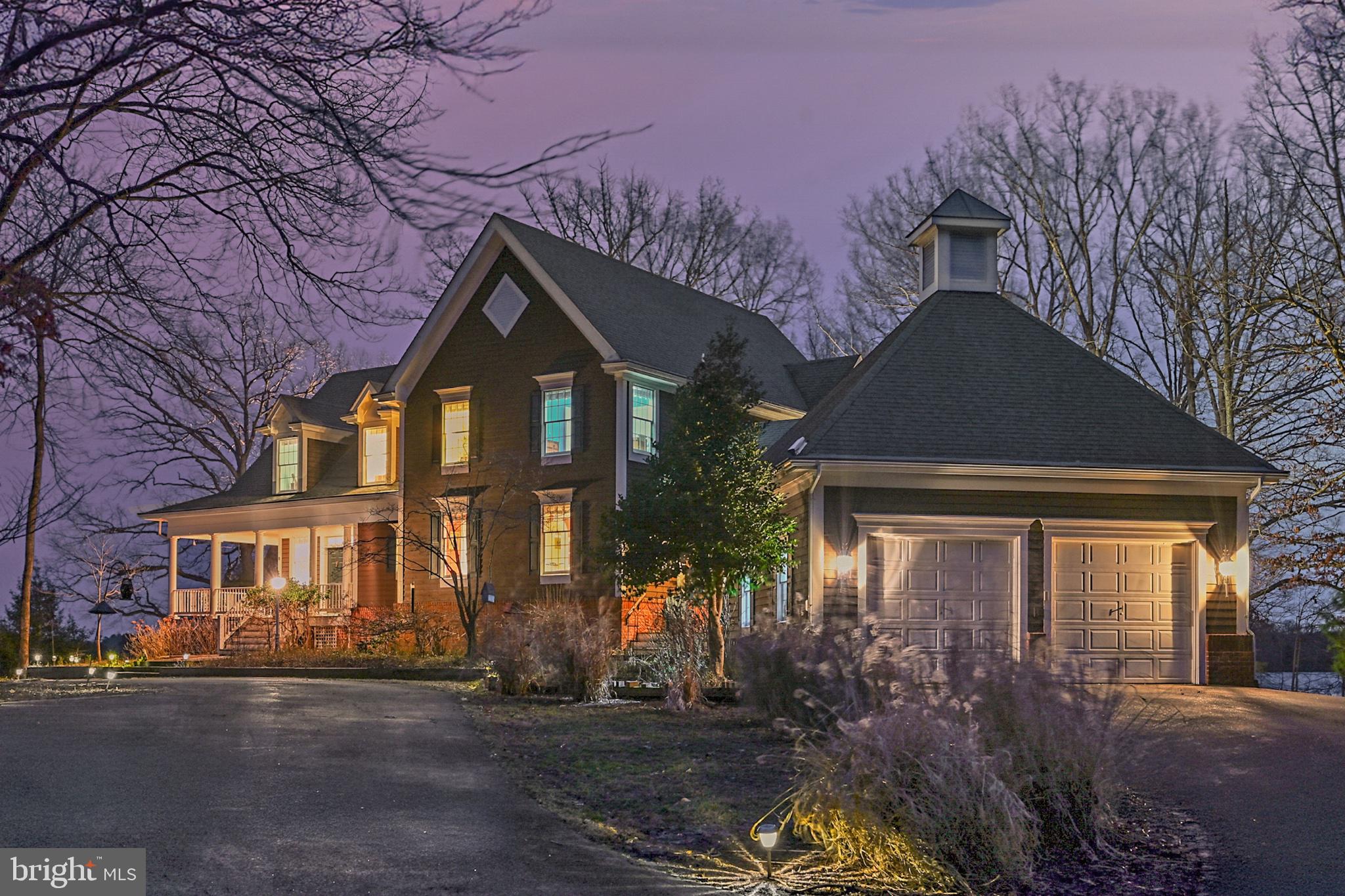 175 Covenant Way Bumpass, VA 23024 - Photo 4 of 91 Elegant home bathed in twilight glow.