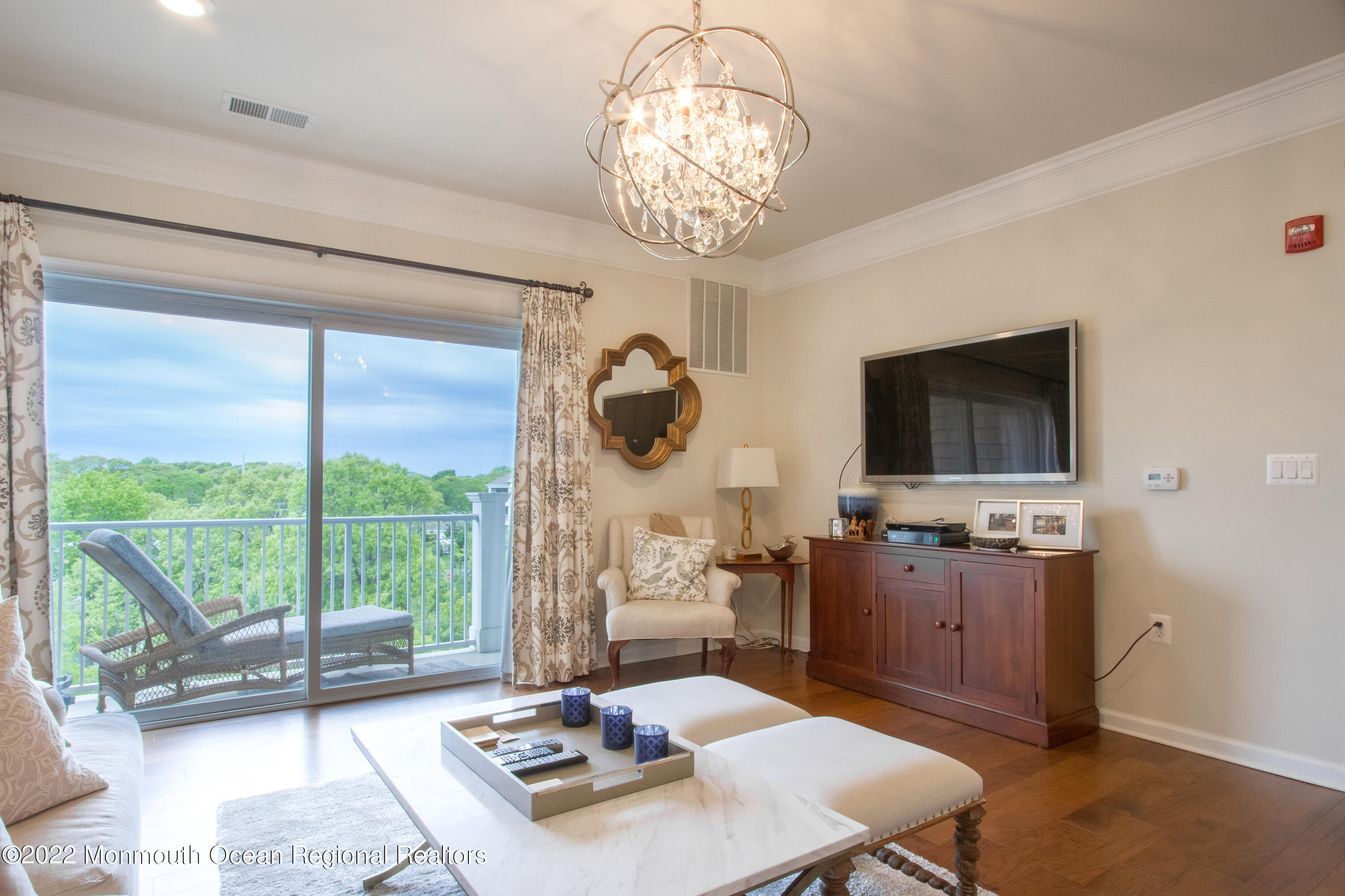 2201 River Road, Unit 4405 Point Pleasant, NJ 08742 - Photo 7 of 19 LIVING ROOM & BALCONY