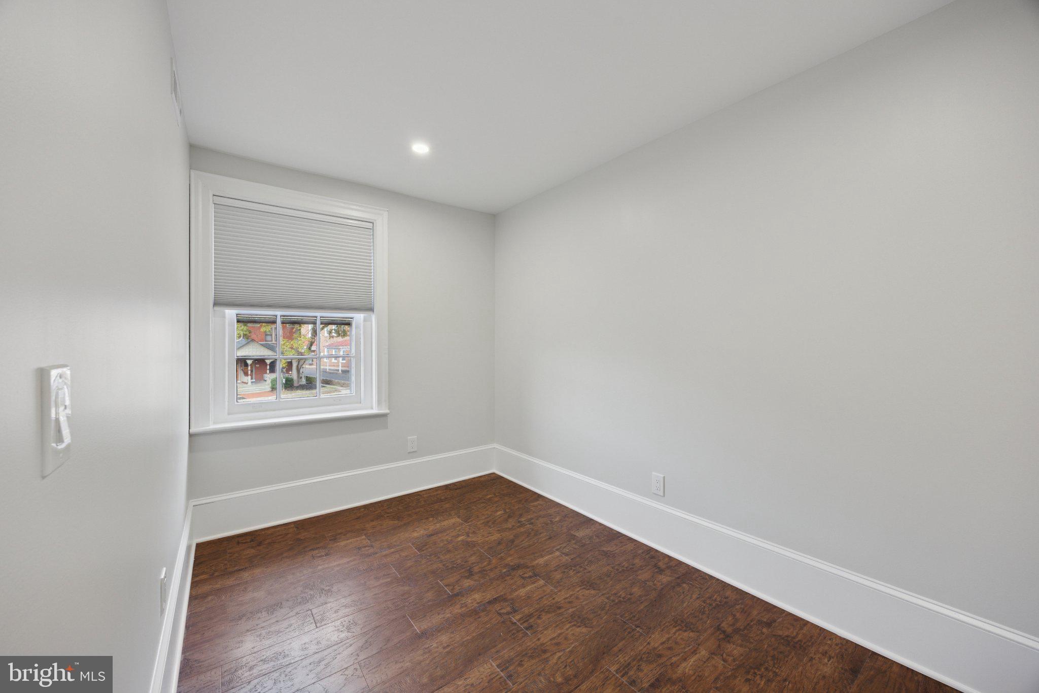 21 South Clinton Street, Unit 2 Doylestown, PA 18901 - Photo 8 of 13 Bright and airy blank canvas room.