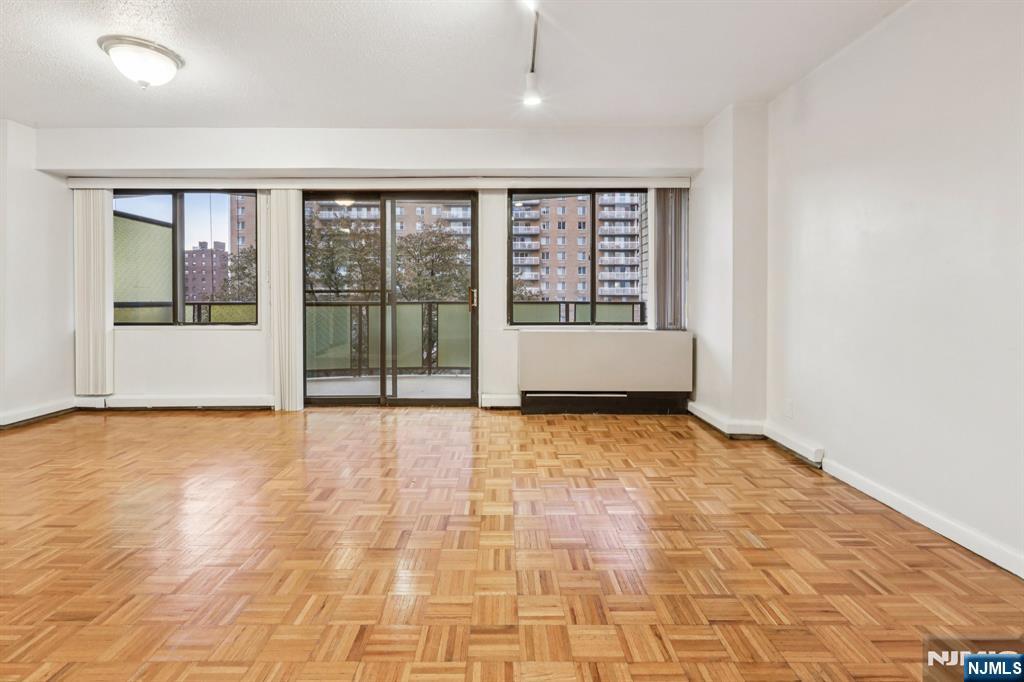 150 Overlook Avenue, Unit 6H Hackensack, NJ 07601 - Photo 11 of 29 a view of an empty room with a window