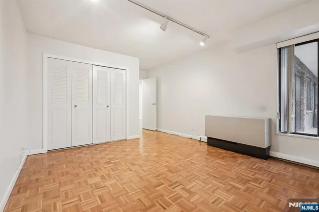 a view of a water heater and a floor to ceiling window