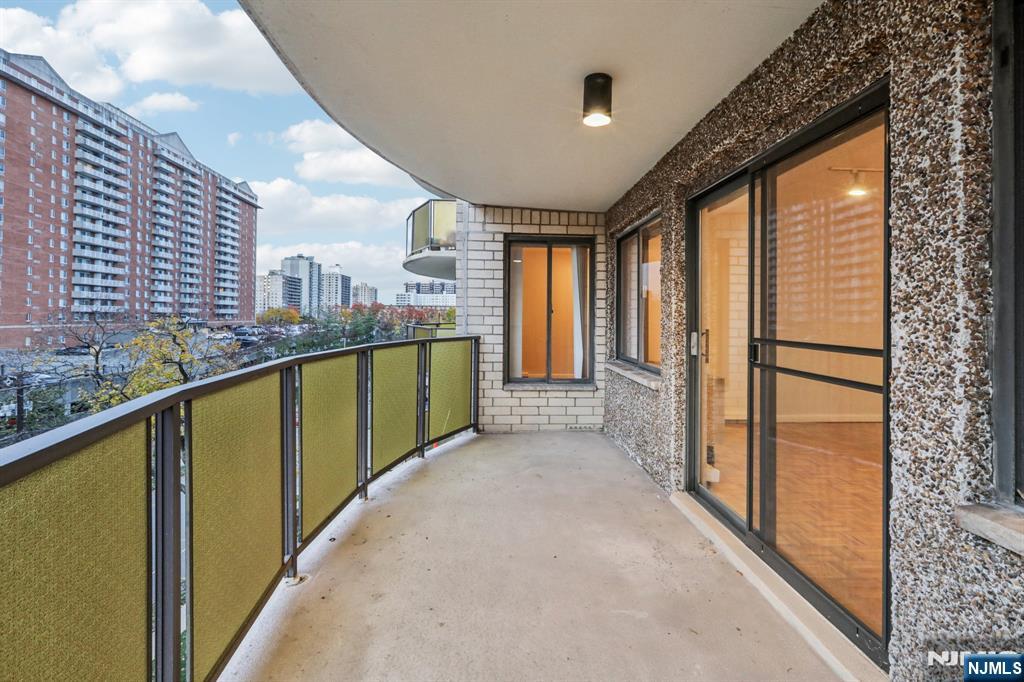 150 Overlook Avenue, Unit 6H Hackensack, NJ 07601 - Photo 27 of 29 a view of a city from a balcony