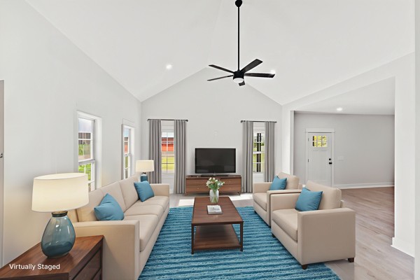 1030 Hanestown Road Lafayette, TN 37083 - Photo 11 of 48 a living room with furniture and a flat screen tv