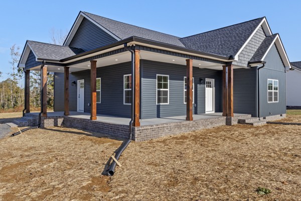 1030 Hanestown Road Lafayette, TN 37083 - Photo 2 of 48 a house with view of outdoor space