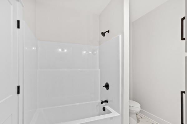 1030 Hanestown Road Lafayette, TN 37083 - Photo 30 of 48 a bathroom with a bathtub