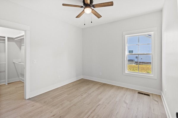 1030 Hanestown Road Lafayette, TN 37083 - Photo 34 of 48 a view of an empty room with wooden floor and a window