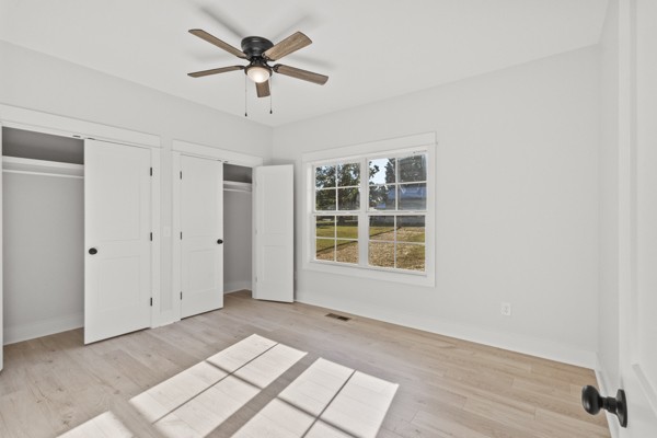 1030 Hanestown Road Lafayette, TN 37083 - Photo 38 of 48 a view of an empty room with a window and wooden floor