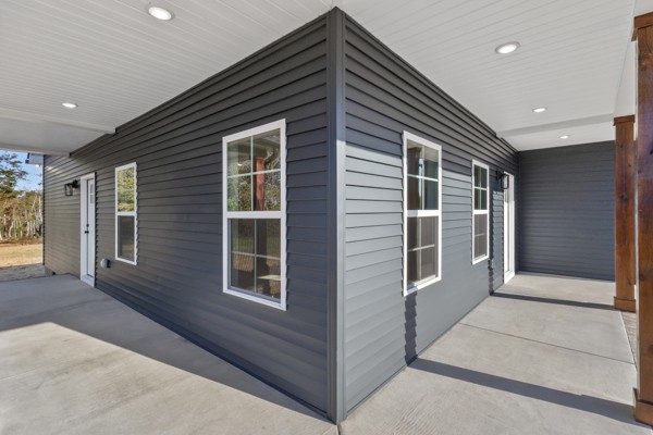 1030 Hanestown Road Lafayette, TN 37083 - Photo 6 of 48 a front view of a house with windows