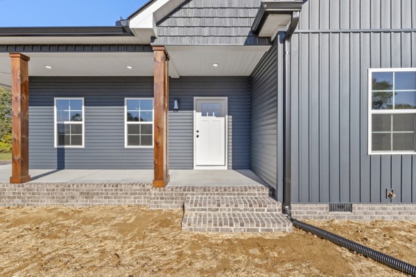 1030 Hanestown Road Lafayette, TN 37083 - Photo 8 of 48 a front view of a house
