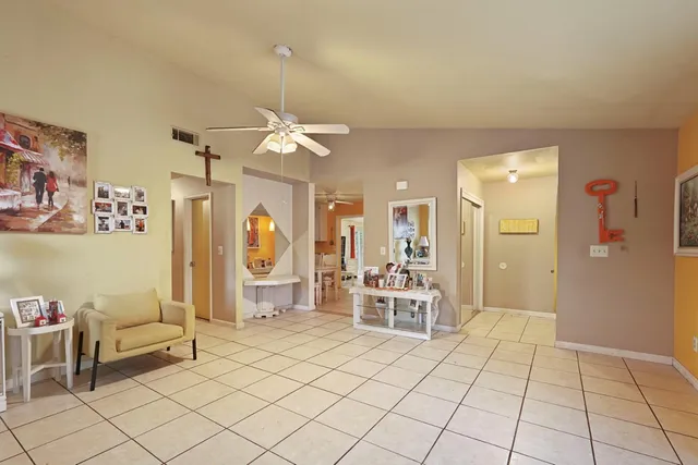a view of a livingroom with furniture and window