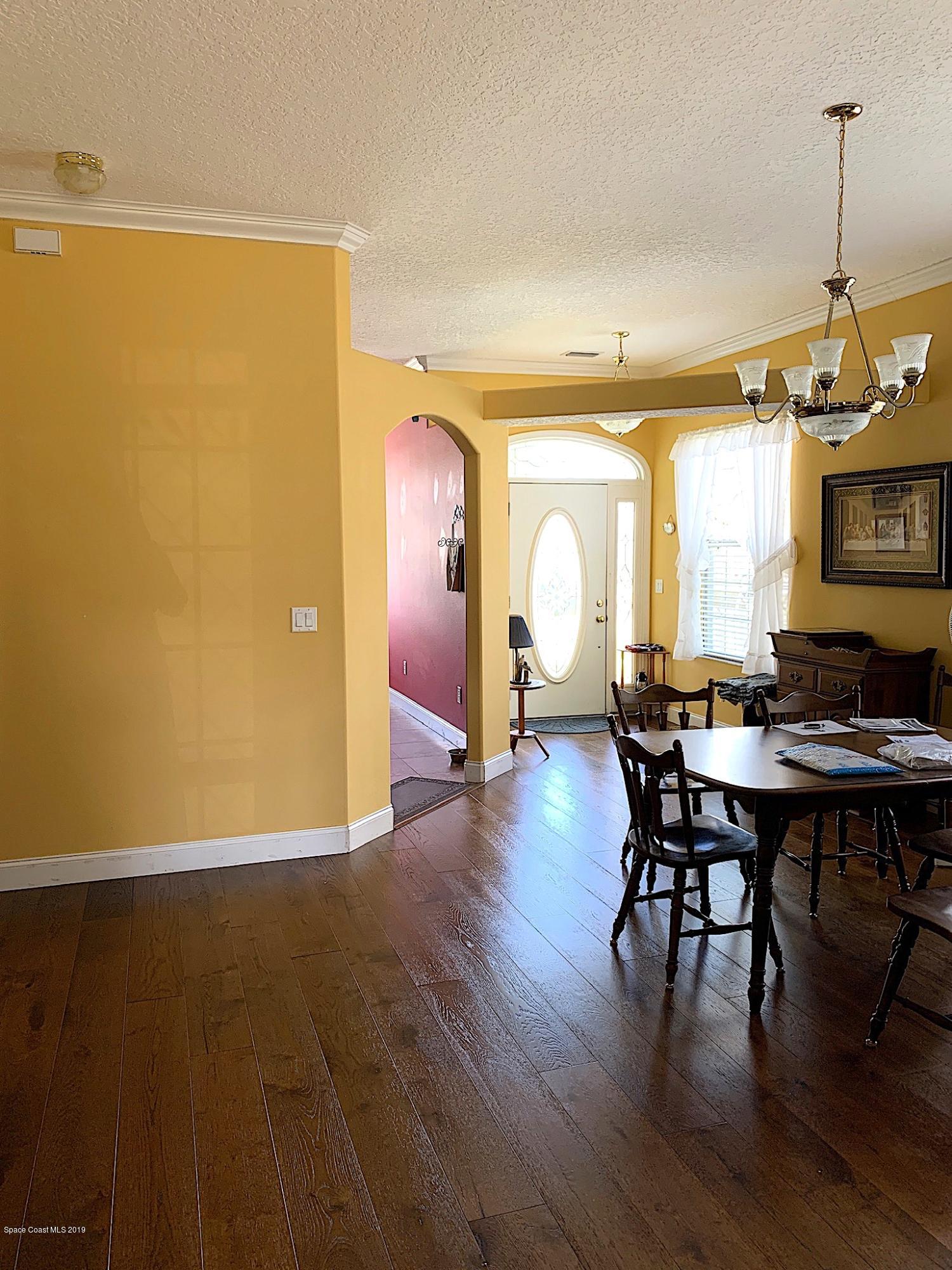 6191 Janina Road Cocoa, FL 32927 - Photo 13 of 22 living looking towards front door