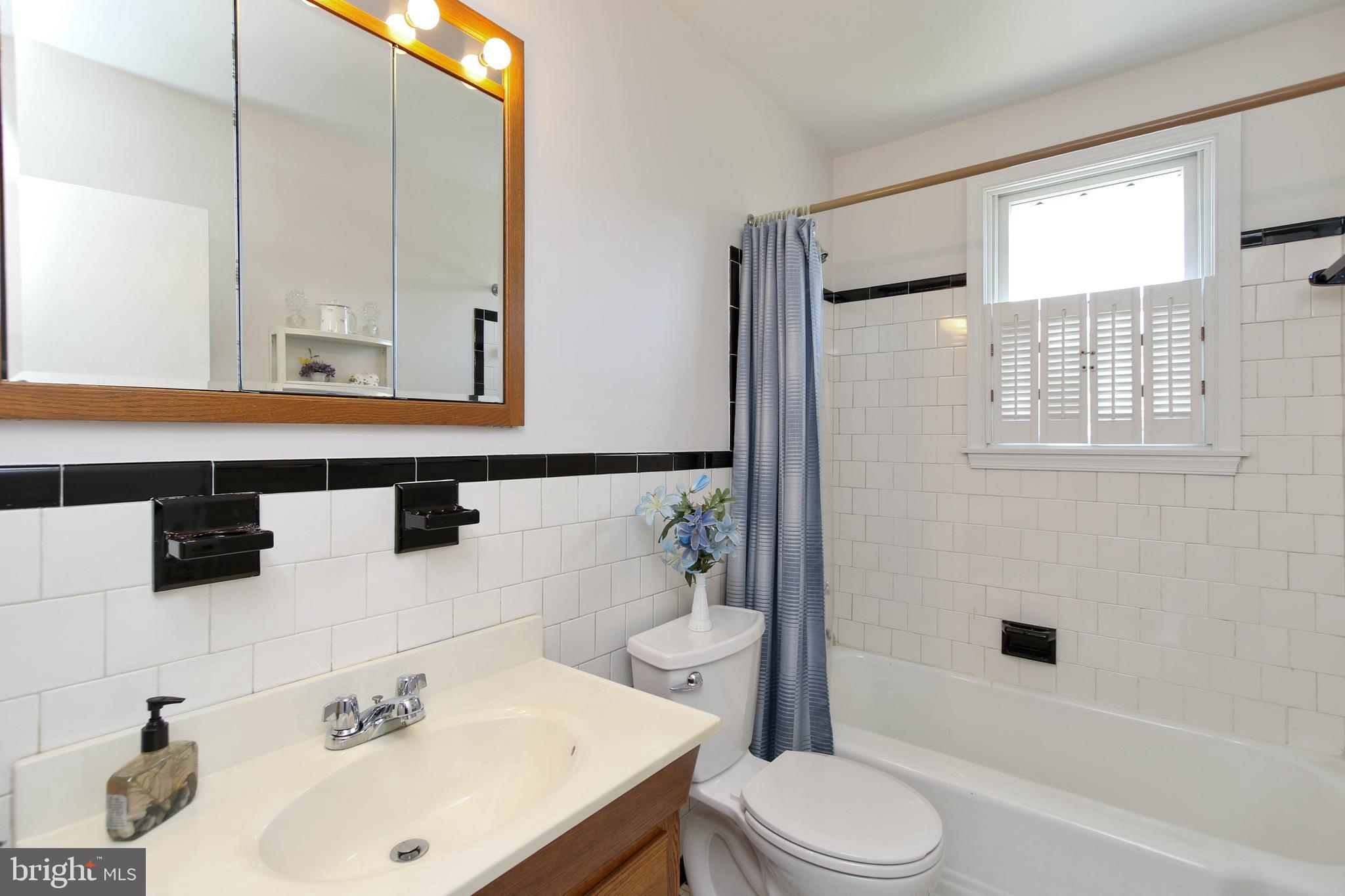 8221 Thornton Road Baltimore, MD 21204 - Photo 22 of 39 Upper Level Hall Bath with Shower/Tub Combo