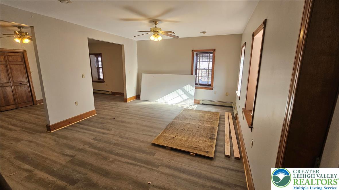253 West Main Street Bath, PA 18014 - Photo 11 of 30 a view of livingroom with hardwood floor and a ceiling fan