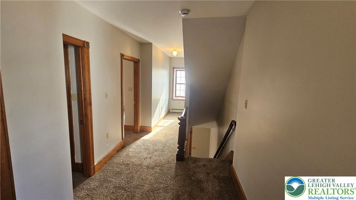 253 West Main Street Bath, PA 18014 - Photo 12 of 30 a view of a hallway with windows